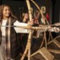 People using interactive arrow exhibition